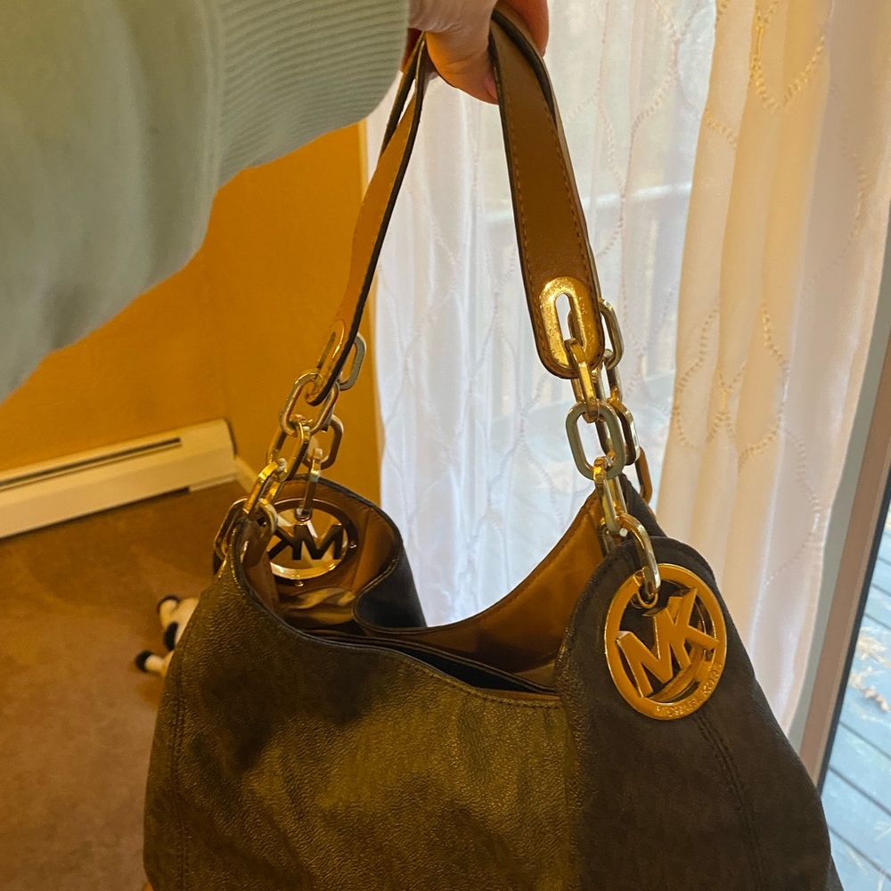 Michael Kors monogrammed hobo.